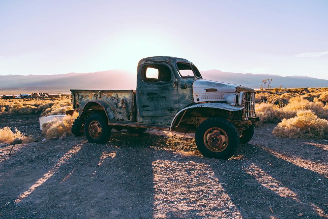 Old truck in front of field - Ash Edmonds